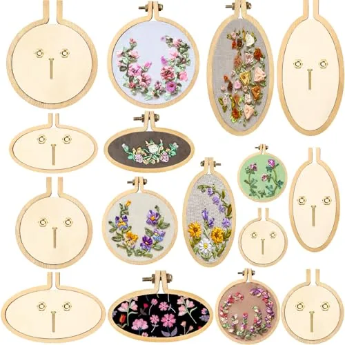 Small wooden embroidery hoops, some holding stitched flowers
