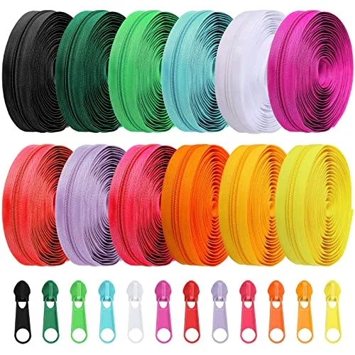 Twelve colours of Syhood #5 zipper tape on rolls with matching pulls